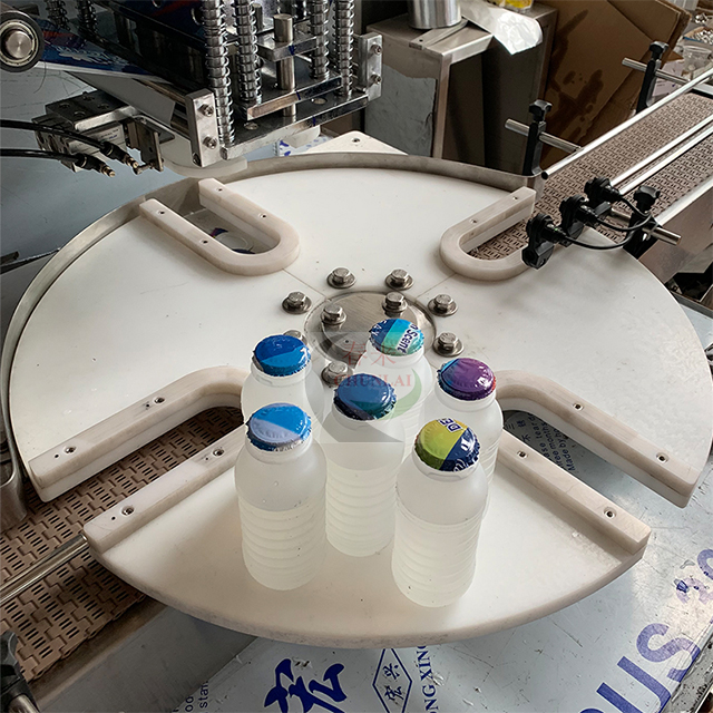 KIS-1800 Rotationsmilchflasche-Dichtungsmaschine